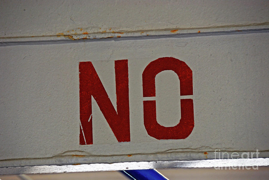Word No tagged on wall Photograph by Sami Sarkis