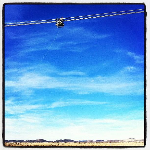 Electricity Photograph - Working On Powerline In Utah by Juan Guevara