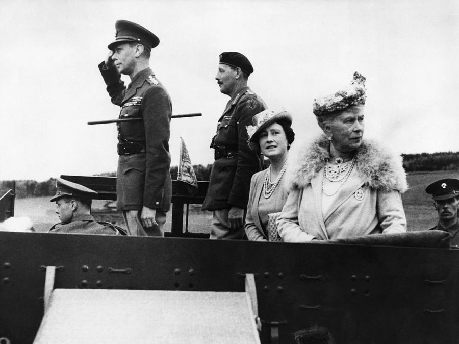 World War II. Left, Saluting British by Everett