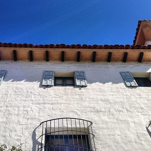 Wrought Iron, Stucco, Tile Roof, Blue Photograph by Jim Spencer