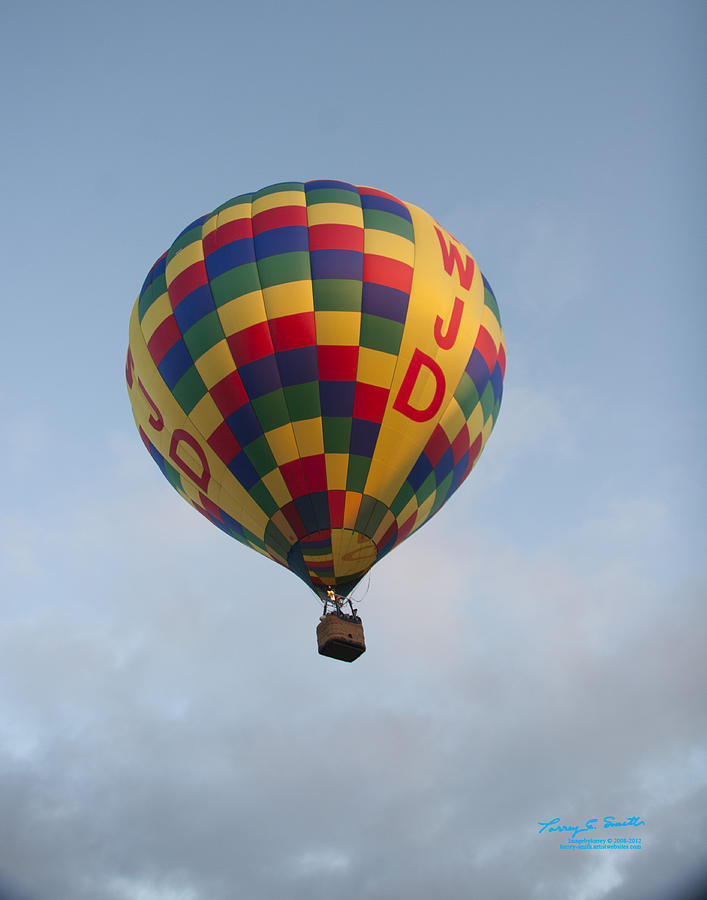 Clouds Photograph - WWJD balloon rising by Torrey E Smith