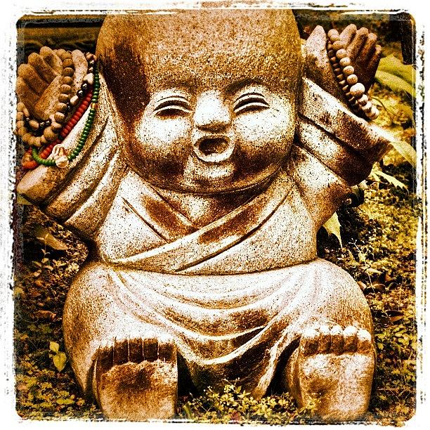 Yay! Baby Buddha Statue At Itsukushima Photograph by Jonathan Tyrrell 