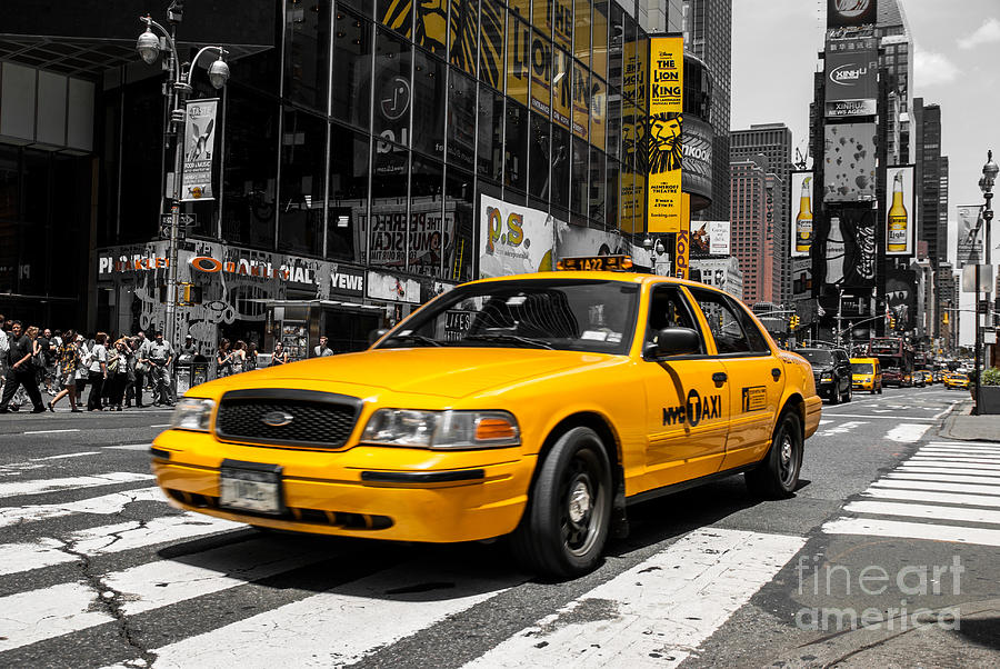 Yellow Cab at the Times Square Photograph by Hannes Cmarits