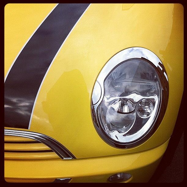 Car Photograph - #yellow #mini #shiney #car #headlamp by Holly Peters