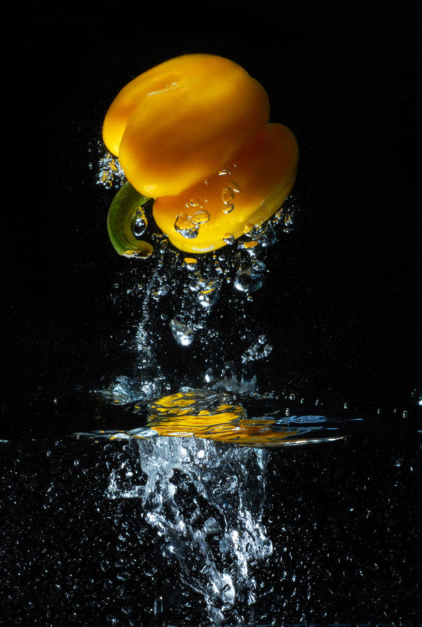 Yellow pepper escapes from water Photograph by Dung Ma