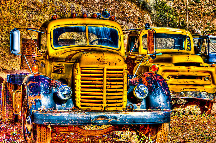 Old Truck Photograph - Yellow Trucks by Jon Berghoff