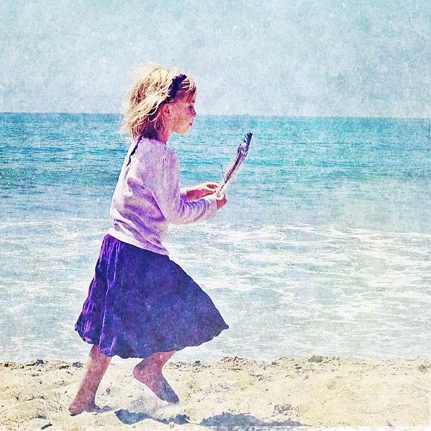 Holiday Photograph - Young Beachcomber #girl #feather #beach by Denise Taylor