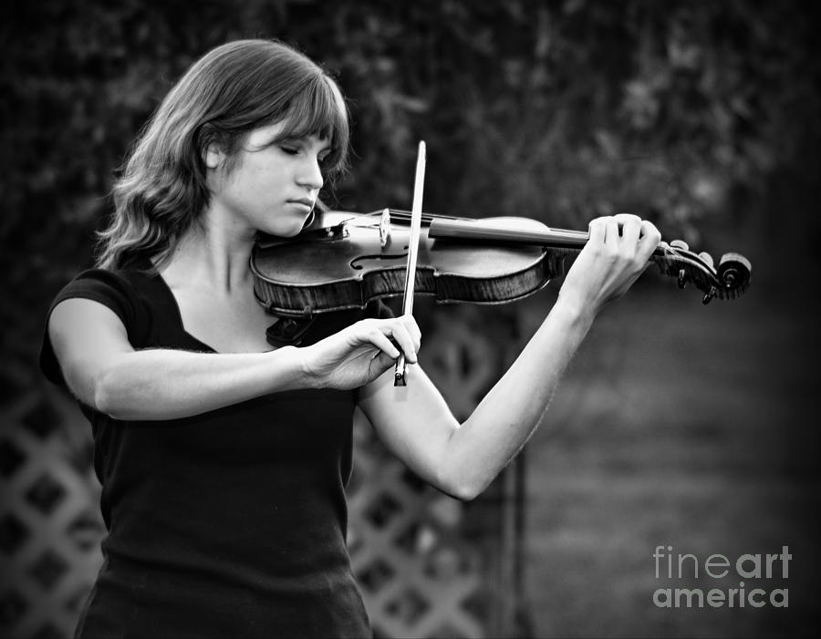 Young Girl Plays Arbor Strings Photograph by Wayne Nielsen