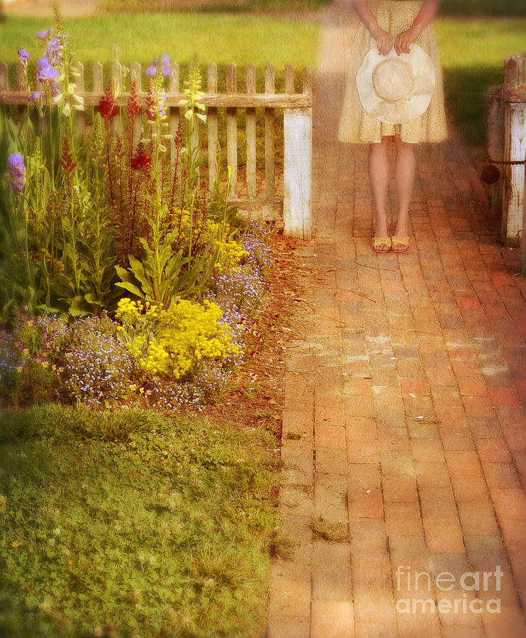 Young Lady by Garden Gate Photograph by Jill Battaglia