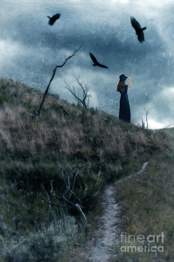 Young Woman on Creepy Path with Black Birds Overhead Photograph by Jill Battaglia