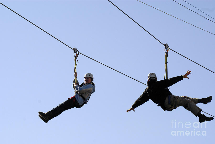 ZIPLINING DUO Vancouver Canada Photograph by John  Mitchell