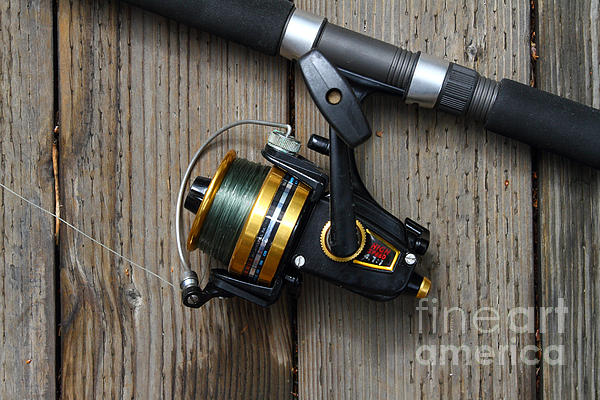 https://images.fineartamerica.com/images-medium/fishing-rod-and-reel-7d13542-wingsdomain-art-and-photography.jpg