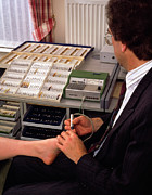 Homeopath Performs Vega Test For Patient Allergies #1 Photograph by Science Photo Library