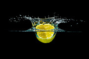 Splashing Lemon #1 Photograph by Peter Lakomy