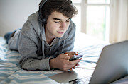 Young Man Using Smartphone #1 Photograph by Science Photo Library