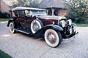1930 Dusenberg Photograph by Allyn Baum