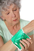 Patient Applying A Thermal Pack #2 Photograph by Science Photo Library