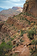 A Man Mountain Biking In Moab, Utah #5 Photograph by Whit Richardson A Man Mountain Biking In Moab, Utah #5 Photograph by Whit Richardson