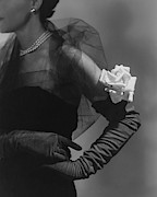 A Model Wearing And Velvet Rose Photograph by Horst P. Horst