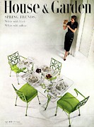 A Patio Table With A Model Standing Behind Photograph by Herbert Matter