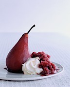 A Poached Pear With Cream Photograph by Romulo Yanes