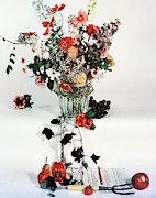 A Studio Shot Of A Vase Of Flowers And A Garden Photograph by Herbert Matter