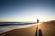 A Young Woman Running At Sunset Photograph by Damiano Levati