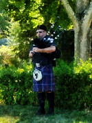 Bagpiper Photograph by Susan Savad Bagpiper Photograph by Susan Savad