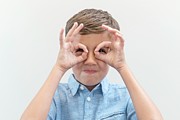 Boy Pretending To Wear Glasses Photograph by Science Photo Library