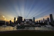 Buckingham Fountain with rays of sunlight Photograph by Sven Brogren