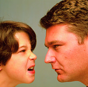 Close-up Of Emotional Boy Angry At His Father Photograph by Science Photo Library