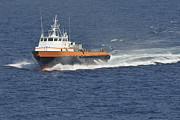 Crew Boat in Blue Ocean Photograph by Bradford Martin