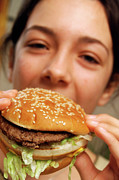Eating Beefburger Sandwich Photograph by Science Photo Library