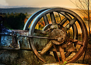 Fall Through the Wheels Photograph by Sue Capuano