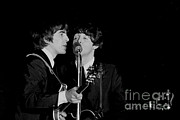 George Harrison & Paul Mccartney Photograph by Larry Mulvehill George Harrison & Paul Mccartney Photograph by Larry Mulvehill