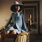 Model Sitting On A Desk Wearing A Double-faced Photograph by Henry Clarke