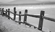 An old wooden fence located near the road by Lake Champlain in Burlington Vermont Photograph by Dejan Jovanovic