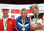 Older Female Athletes On Medals Rostrum Photograph by Science Photo Library