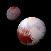 Pluto And Charon Photograph by Science Photo Library