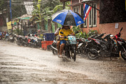 Scooter driving at monsoon rain, Koh Tao, Thailand Photograph by Taikrixel