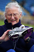 Senior Athlete With Sports Shoe Photograph by Science Photo Library