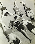 Simone Demaria And Models Sunbathing On A Beach Photograph by George Hoyningen-Huene