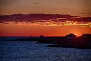 Sun rising over Straightsmouth Light Photograph by Jeff Folger