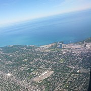 View Of City And Ocean From Airplane Photograph by Suzana Jelinic