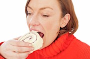 Woman Eating Cake Photograph by Science Photo Library