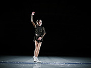 Young Female Figure Skater Finishing Photograph by Thomas Barwick
