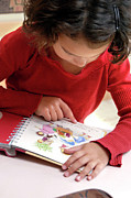 Young Girl Reading Photograph by Science Photo Library