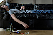 Young Man Holding Beer Photograph by Science Photo Library