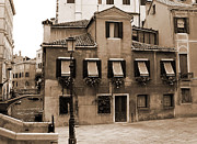 Courtyard By The Canal Photograph by Donna Corless