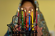 Lighting the Chanukia Photograph by Yossi Aptekar Lighting the Chanukia Photograph by Yossi Aptekar